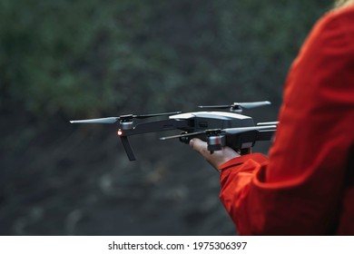 Drone ready to fly off a hand