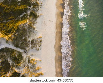 Drone shot. Aerial photography. East coast white sand beach aerial photography. Drone photography of a beach. Beautiful view from above. 