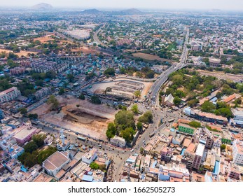 drone shot aerial view of Madurai tamilnadu india cityscape beautiful weather bright sunny day churche temple Mahal palace roads traffic construction busy olden town ancient 