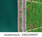 drone shot aerial view top angle panoramic photograph of Vaigai dam reservoir irrigation project india tamilnadu madurai tourism river mountain Bridge turquoise blue water cloudy wallpaper background 