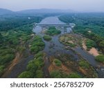 drone shot aerial view top angle riverside riverbed river bank vaigai kaveri krishna island delta grassland wetlands swamp flood rainwater rainforest evergreen alluvial soil turquoise blue water india