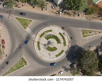 Drone Shot Aerial View Top Angle Bright Sunny Day Overhead Photo Of City Traffic Roads Crossover Junction Circular Roundabout Green Grass India Tamilnadu Madurai 