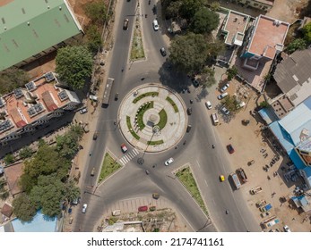 Drone Shot Aerial View Top Angle Bright Sunny Day Overhead Photo Of City Traffic Roads Crossover Junction Circular Roundabout Green Grass India Tamilnadu Madurai 