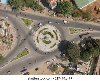 Drone Shot Aerial View Top Angle Bright Sunny Day Overhead Photo Of City Traffic Roads Crossover Junction Circular Roundabout Green Grass India Tamilnadu Madurai 