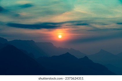 drone shot aerial view top angle panoramic beautiful photograph of early morning sunrise dawn mountain range Western Ghats india Kolukkumalai Munnar tourist spot hill peak wallpaper background sunset  - Powered by Shutterstock