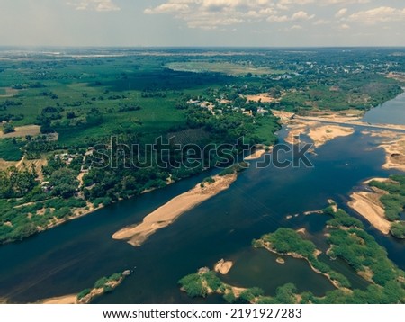drone shot aerial view top angle bright sunny day river riverbed dried lake turquoise blue water tourism india tamilnadu white sand islands flood landscape wallpaper background grasslands 