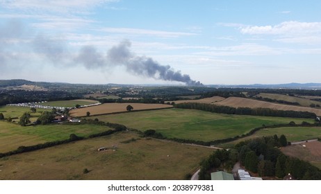 A Drone shot of a building on fire in Kidderminster, UK. High quality large warehouse fire in urban area. - Shutterstock ID 2038979381