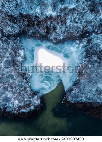 A drone shot of a frozen lake