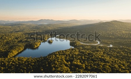 Drone shot of Lake in the adirondack mountain wilderness
