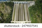 drone shot of a large Dam Spillway Structure