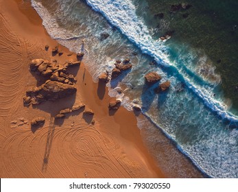 A Drone Shot Of Redhead Beach At Sunrise, Over The Shark Tower.