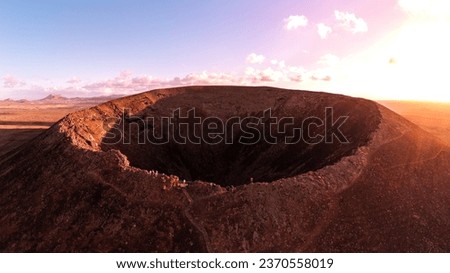 Drone shot of the volcano Calderón Hondo at sunset on the island of Fuerteventura in Spain