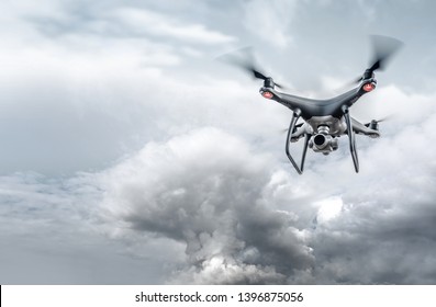 Drone in the sky. Unmanned aerial vehicle flying in the air.