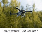 Drone take-off. Quadcopter with lamp. Propellers lift camera up. Drone flight details.