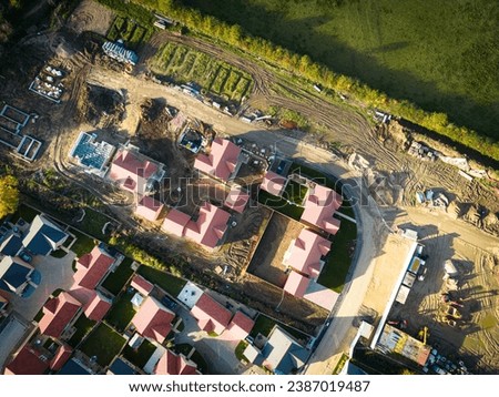 Drone top down view of private and affordable housing in development in East Anglia, UK.