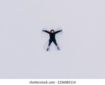 Drone Top View Snow Angel Man In December