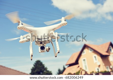 drone usage. private property protection with quadrocopter or real estate construction check
