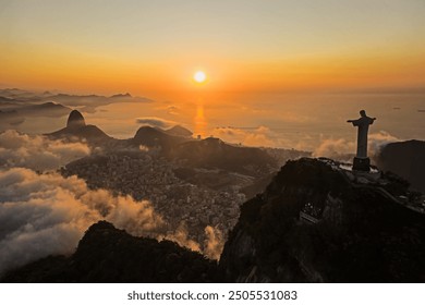 Drone view of Christ the Redeemer during the sunrise over Guanamara Bay in Rio de Janeiro - Powered by Shutterstock