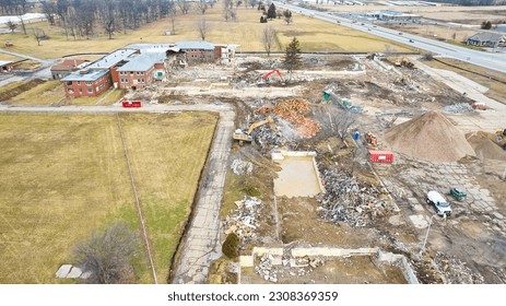 Drone view construction zone around old abandoned hospital building