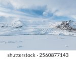 Drone view. Destruction of the glacier in Iceland. Aerial view on the glacier. Famous place in Iceland. Winter landscape on the north. Photo for background, wallpaper, postcards.