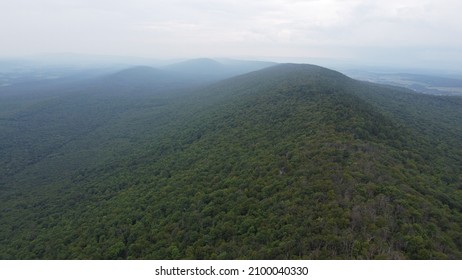 A Drone View Flying Above The Green Pennsylvanian Appalachian Summer Mountain Forest.