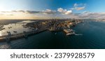 Drone view of Galata Bridge and Beyoglu district. A wide panorama of spring Istanbul at sunset.