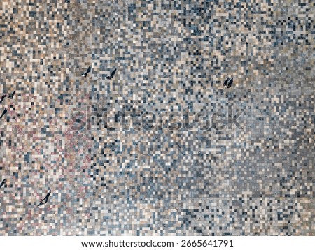 Drone view looking straight down at the pattern of tiles that make up Skanderbeg Square in downtown Tirana