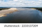 Drone view looking upstream on the Mississippi River near Grand Gulf, Mississippi. Sandbars on left ascending bank.