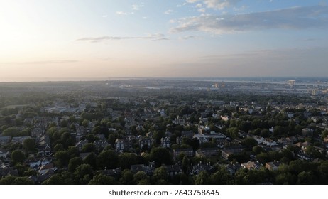 Drone view of low sunset small urban housing area - Wirral, Merseyside, Birkenhead, UK