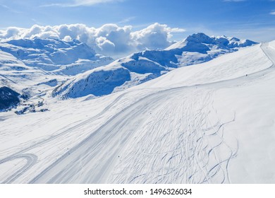 Drone view of mountain ski slopes.