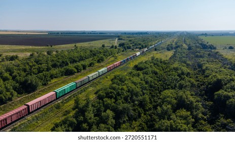 A drone view of a moving freight train