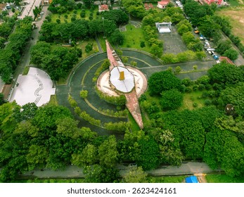 Drone view of a notable structure in a small countryside town.