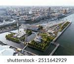 Drone view of Old Port City waterfront park with an entertainment venue and Jacques Cartier Bridge in the background. Montreal, Canada