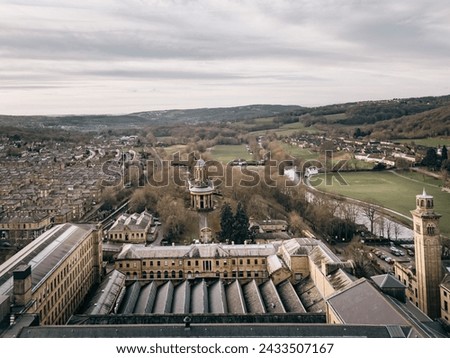 Drone view over Salts Mill, Saltaire, an old Victorian textile mill in Bradford, West Yorkshire, renovated for use as art gallery.