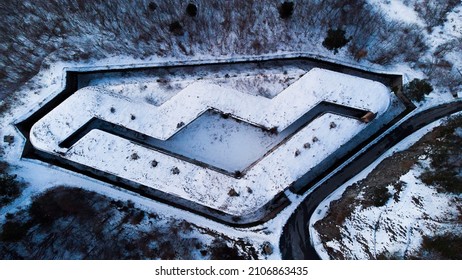 Drone View Over Snow Mountains And Iced Rivers