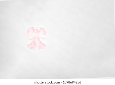 Drone View Of A Pink Snow Angel Made In The Snow, Copy Space