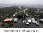 A drone view shows houses and streets flooded as Hurricane Debby affects the Gulf Coast in Suwannee