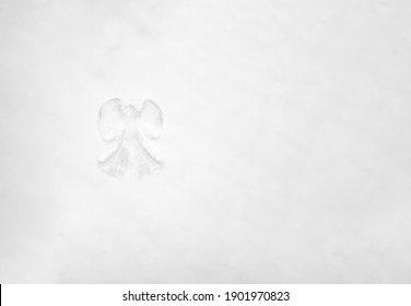 Drone View Of A Snow Angel Made In The Snow, Copy Space