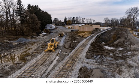A Drone View of a Train Freight Yard being Constructed With New Railroad Tracks and Switches