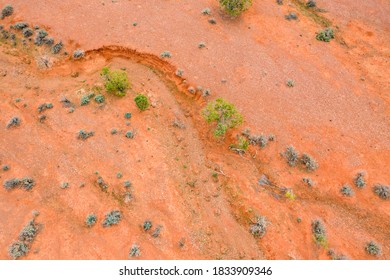 Drone Viewpoint Looking Down On The Red Dirt Colors And Patterns Of The Drought Areas Of Outback Australia