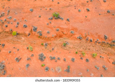 Drone Viewpoint Looking Down On The Red Dirt Colors And Patterns Of The Drought Areas Of Outback Australia