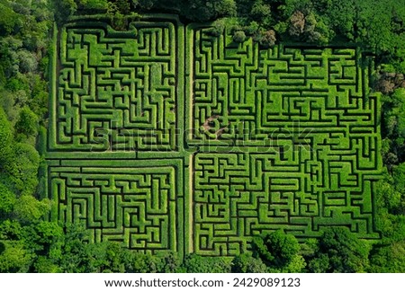 Drones eye view of a maze or labyrinth in the formal gardens of a French chateau.