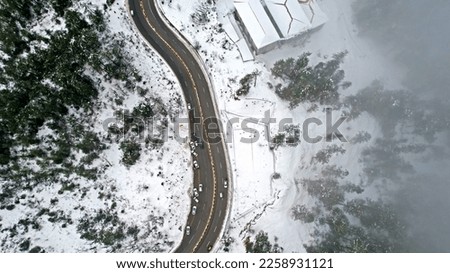 Drones Eye View - winter winding road from the high mountain pass in Pakistan