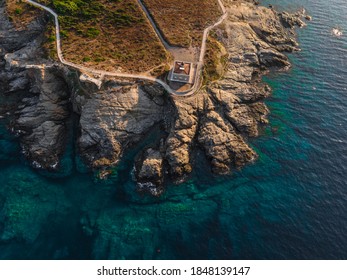 Drones views over the lighthouse at sunset time