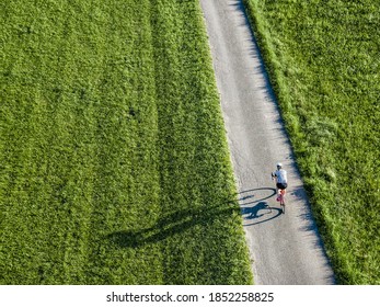 droneview of an athlete on a bicycle