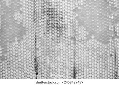 Drop of bee honey drip from hexagonal honeycombs filled with golden nectar, honeycombs summer composition consisting of drop natural honey, drip on wax frame bee, drop of bee honey drip in honeycombs