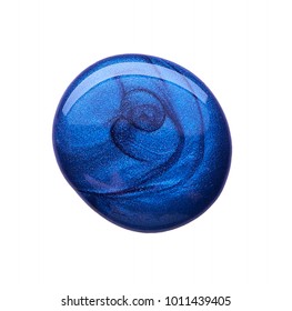 Drop of dark blue nail polish isolated on white background