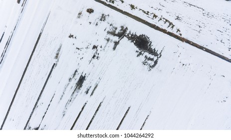 Drop down view of snow covered fields.