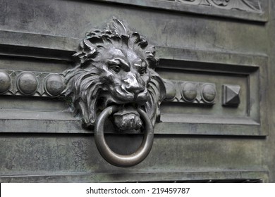 drop forged brass vintage door knocker in the form of a lion's head