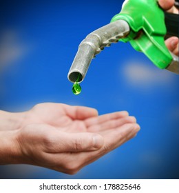 Drop Of Green Fuel On Euro Background